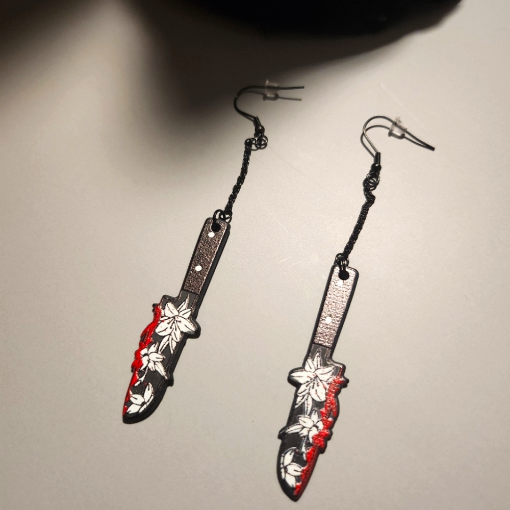 Dangling knife earrings